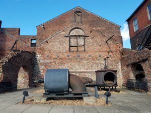 Historic machinery and brick structures at Tredegar Iron Works in Richmond Virginia