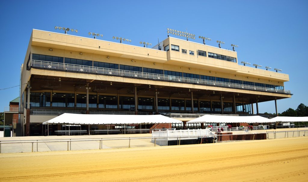 The grandstand at Colonial Downs Racetrack viewed from the dirt racing surface in New Kent County, Virginia.