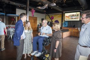 Virginia state senator speaking with Zannino Engineering founder Tom Zannino, Lisa Zannino, President Rob Childree, and Denise Childree at the company's 35th anniversary celebration.