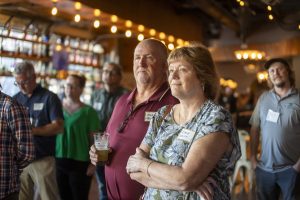 Attendees listening to remarks during Zannino Engineering’s 35th anniversary reception at River City Roll.