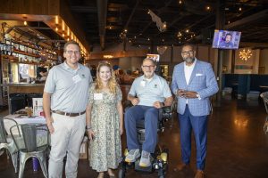 Henrico County Supervisor Rev. Cooper with Zannino Engineering President Rob Childree, Denise Childree, and founder Tom Zannino at the company's 35th anniversary celebration.
